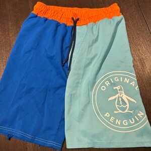 4 pair swim trunks and one swim shirt